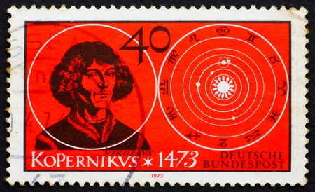 GERMANY - CIRCA 1973: a stamp printed in the Germany shows Nicolaus Copernicus, Renaissance Astronomer, circa 1973の写真素材