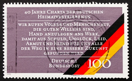 GERMANY - CIRCA 1990: a stamp printed in the Germany shows 40th Anniversary of Charter of German Expellees, Right to the Homeland is one of the fundamental rights of mankind, circa 1990の写真素材