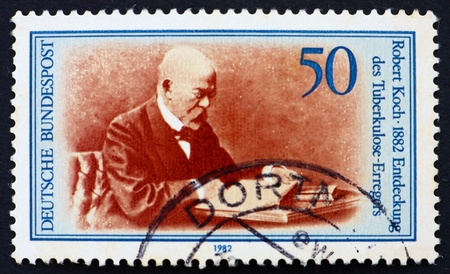 GERMANY - CIRCA 1982: a stamp printed in the Germany shows Robert Koch, Discoverer of Tubercle Bacillus, circa 1982のeditorial素材