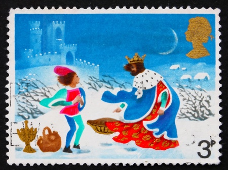 GREAT BRITAIN - CIRCA 1973: a stamp printed in the Great Britain shows Page in storm, Illustration for Christmas carol Good king Wenceslas, circa 1973の写真素材