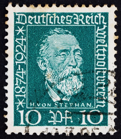 GERMANY - CIRCA 1924: a stamp printed in the Germany shows Dr. Heinrich von Stephan, general post director for the German Empire, circa 1924のeditorial素材