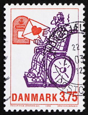 DENMARK - CIRCA 1992: a stamp printed in the Denmark shows Love Letter, by Phillip Stein Jonsson, circa 1992の写真素材
