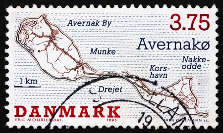 DENMARK - CIRCA 1995: a stamp printed in the Denmark shows Avernako, Danish Island, circa 1995の写真素材