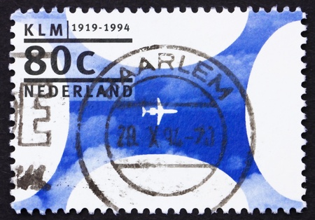 NETHERLANDS - CIRCA 1994: a stamp printed in the Netherlands shows KLM, Royal Dutch Airlines, 75th Anniversary of Dutch Aviation, circa 1994の写真素材