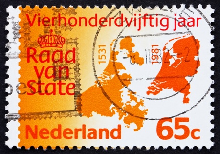 NETHERLANDS - CIRCA 1981: a stamp printed in the Netherlands shows Maps of Netherlands, 450th Anniversary of Council of State, circa 1981の写真素材