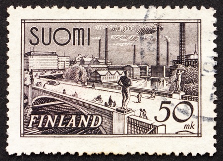FINLAND - CIRCA 1942: a stamp printed in the Finland shows Hame Bridge, Tampere, circa 1942の写真素材