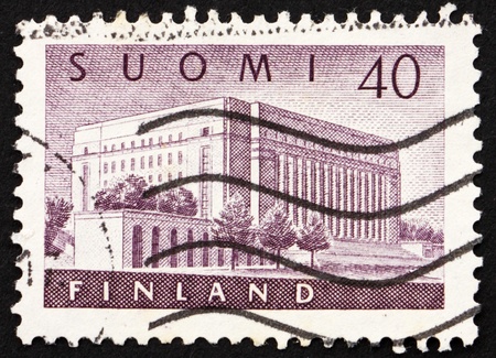 FINLAND - CIRCA 1956: a stamp printed in the Finland shows House of Parliament, Helsinki, circa 1956の写真素材