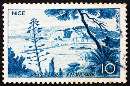 FRANCE - CIRCA 1955: a stamp printed in the France shows Nice, France, circa 1955の写真素材