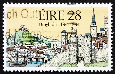 IRELAND - CIRCA 1994: a stamp printed in the Ireland shows Medieval View of Drogheda, 800th Anniversary of Drogheda, circa 1994の写真素材