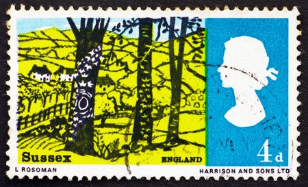 GREAT BRITAIN - CIRCA 1966: a stamp printed in the Great Britain shows Landscape near Hassock, Sussex, circa 1966の写真素材