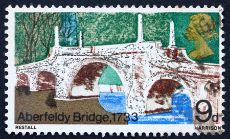 GREAT BRITAIN - CIRCA 1968: a stamp printed in the Great Britain shows Aberfeldy Bridge, Perthshire, 1733, circa 1968の写真素材