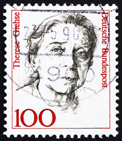 GERMANY - CIRCA 1988: a stamp printed in the Germany shows Therese Giehse, Actress, circa 1988のeditorial素材