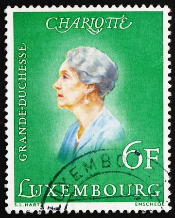 LUXEMBOURG - CIRCA 1976: a stamp printed in the Luxembourg shows Charlotte, Grand Duchess of Luxembourg, Reign from 1919 to 1964, circa 1976のeditorial素材