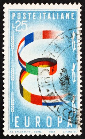 ITALY - CIRCA 1957: a stamp printed in the Italy shows Flags of United Europe, United Europe for Peace and Prosperity, circa 1957のeditorial素材