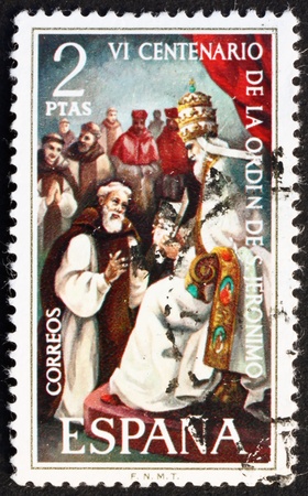 SPAIN - CIRCA 1973: a stamp printed in the Spain shows Pope Gregory XI and Pedro Fernandez Pecha, 600th Anniversary of the Founding of the Order of the Hermites of St. Jerome, circa 1973のeditorial素材