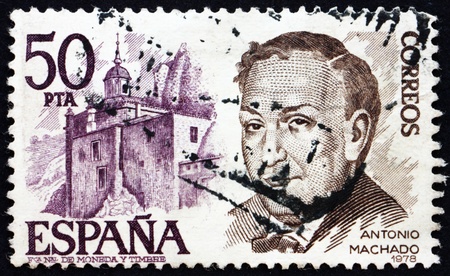SPAIN - CIRCA 1978: a stamp printed in the Spain shows Antonio Machado Ruiz and Castle, Poet and Playwright, circa 1978のeditorial素材