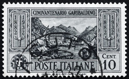ITALY - CIRCA 1932: a stamp printed in the Italy shows View of Caprera, 50th Anniversary of the Death of Giuseppe Garibaldi, Patriot, circa 1932のeditorial素材