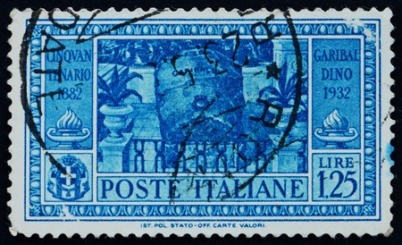 ITALY - CIRCA 1932: a stamp printed in the Italy shows Garibaldis Tomb, 50th Anniversary of the Death of Giuseppe Garibaldi, Patriot, circa 1932のeditorial素材