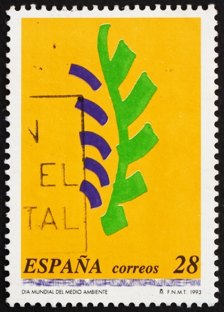 SPAIN - CIRCA 1993: a stamp printed in the Spain shows Emblem of World Environment Day, circa 1993のeditorial素材