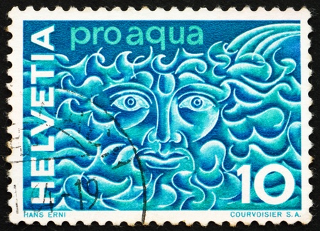SWITZERLAND - CIRCA 1964: a stamp printed in the Switzerland shows Symbolic Water God and Waves, Pro Aqua Water Conservation Campaign, circa 1964のeditorial素材