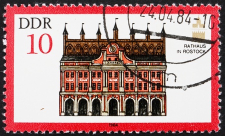 GDR - CIRCA 1984: a stamp printed in GDR shows Town Hall, Rostock, Germany, circa 1984