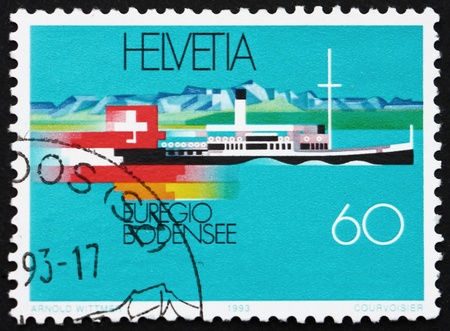 SWITZERLAND - CIRCA 1993: a stamp printed in the Switzerland shows Lake Constance Steamer Hohentwiel, circa 1993のeditorial素材