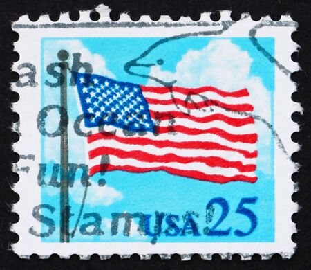 UNITED STATES OF AMERICA - CIRCA 1988: a stamp printed in the USA shows USA Flag in the Sky, circa...