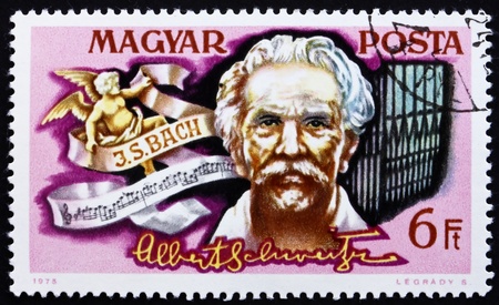 HUNGARY - CIRCA 1975: a stamp printed in the Hungary shows Portrait and Signature of Dr. Albert Schweitzer, Medical Missionary and Musician, circa 1975のeditorial素材