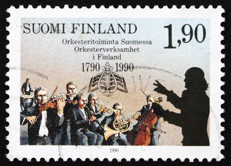 FINLAND - CIRCA 1990: a stamp printed in the Finland shows Finnish Orchestras and Musical Society of Turku, 200th Anniversary, circa 1990のeditorial素材