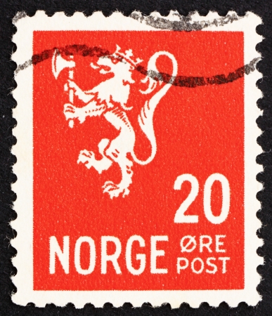 NORWAY - CIRCA 1937: a stamp printed in the Norway shows Lion Rampant, Norwegian Lion, circa 1937のeditorial素材