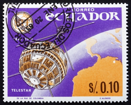 ECUADOR - CIRCA 1966: a stamp printed in the Ecuador shows Telstar, 1st Television Connection of the US and Europe through Telstar Satellite, circa 1966のeditorial素材