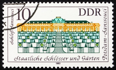 GDR - CIRCA 1983: a stamp printed in GDR shows Sanssouci Palace, Summer Palace of Frederick the Great, King of Prussia, Potsdam Gardens, Germany, circa 1983のeditorial素材