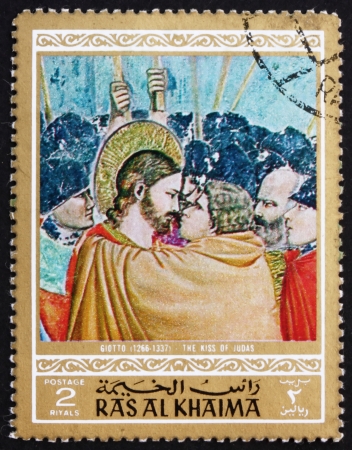 RAS AL-KHAIMAH - CIRCA 1970: a stamp printed in the Ras al-Khaimah shows The Kiss of Judas, Painting by Giotto di Bondone, Life of Jesus Christ, circa 1970のeditorial素材
