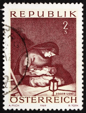 AUSTRIA - CIRCA 1969: a stamp printed in the Austria shows Madonna, Painting by Albin Egger-Lienz, Christmas, circa 1969のeditorial素材