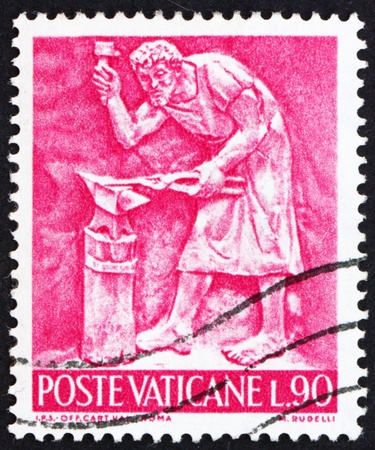 VATICAN - CIRCA 1966: a stamp printed in the Vatican shows Pope Paul VI, Blacksmith, Bas-relief by Mario Rudelli from the Chair in the Pope's Private Chapel, circa 1966のeditorial素材