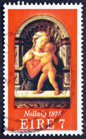 IRELAND - CIRCA 1975: a stamp printed in the Ireland shows Madona and Child, Painting by Fra Filippo Lippi, Christmas, circa 1975のeditorial素材