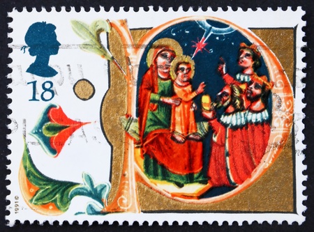 GREAT BRITAIN - CIRCA 1991: a stamp printed in the Great Britain shows Adoration of the Magi, Illuminated Letters from Venetian Manuscript, Christmas, circa 1991のeditorial素材