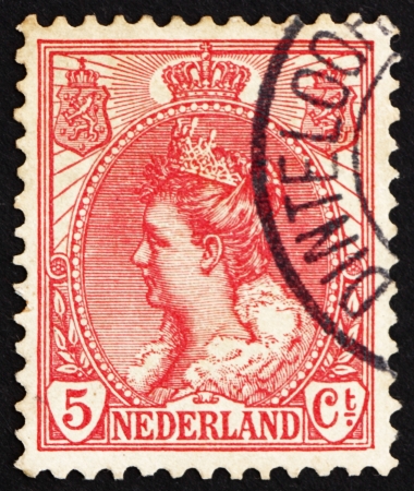 NETHERLANDS - CIRCA 1898: a stamp printed in the Netherlands shows Queen Wilhelmina, circa 1898のeditorial素材