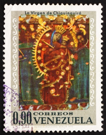 VENEZUELA - CIRCA 1970: a stamp printed in the Venezuela shows Virgin of Chiquinquira, Design from Venezuelan Church, circa 1970のeditorial素材