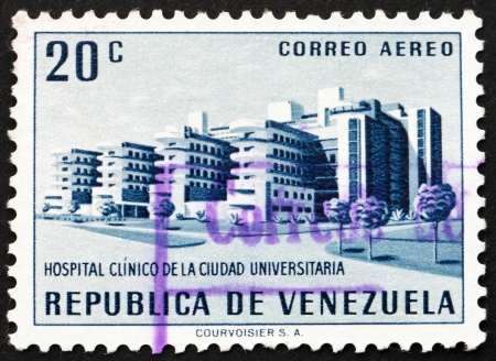VENEZUELA - CIRCA 1956: a stamp printed in the Venezuela shows University Hospital, Caracas, circa 1956のeditorial素材