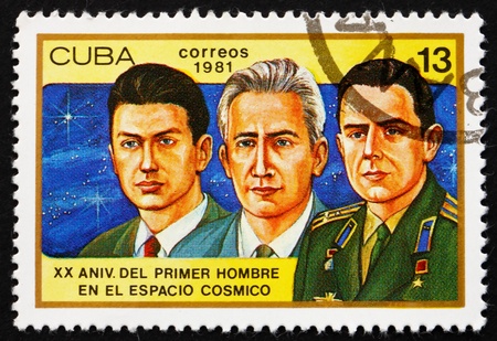 CUBA - CIRCA 1981: a stamp printed in the Cuba shows Konstantin Feoktistov, Boris Yegorov and Vladimir Komarev, Voskhod 1 Crew, 20th Anniversary of 1st Man in Space, circa 1981のeditorial素材