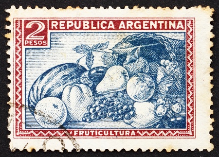 ARGENTINA - CIRCA 1936: a stamp printed in the Argentina shows Fruit, Food, circa 1936のeditorial素材