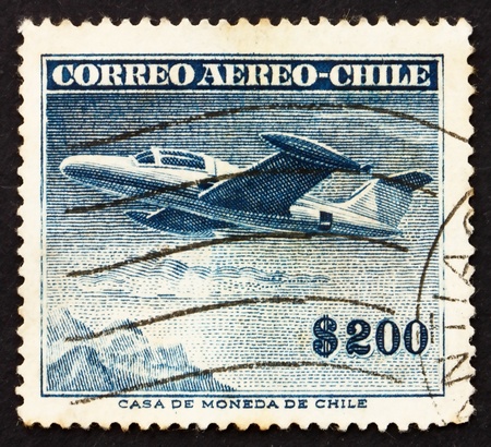 CHILE - CIRCA 1955: a stamp printed in the Chile shows Beechcraft Monoplane, circa 1955のeditorial素材