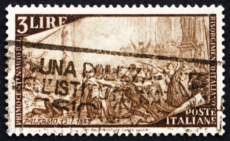 ITALY - CIRCA 1948: a stamp printed in the Italy shows Uprising at Palermo, Centenary of the Risorgimento, Uprisings of 1848-49 which Led to Italian Unification, circa 1948のeditorial素材