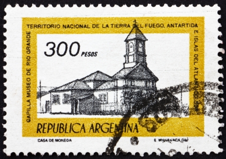 ARGENTINA - CIRCA 1978: a stamp printed in the Argentina shows Chapel of Rio Grande Museum, Tierra del Fuego, Argentina, circa 1978のeditorial素材