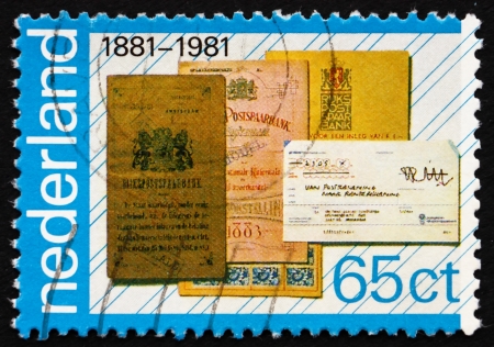 NETHERLANDS - CIRCA 1981: a stamp printed in the Netherlands shows Bank Books, Centenary of National Savings Bank, circa 1981のeditorial素材