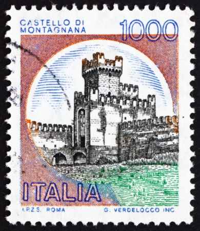 ITALY - CIRCA 1980: a stamp printed in the Italy shows Castle Montagnana, Padua, circa 1980のeditorial素材