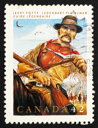 CANADA - CIRCA 1992: a stamp printed in the Canada shows Jerry Potts, Guide, Interpreter, Legendary Hero, circa 1992のeditorial素材
