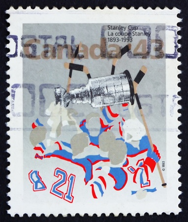 CANADA - CIRCA 1993: a stamp printed in the Canada shows Stanley Cup, Centenary, circa 1993のeditorial素材