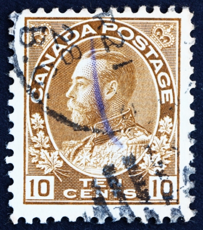 CANADA - CIRCA 1925 a stamp printed in the Canada shows King George V, King of England, circa 1925のeditorial素材
